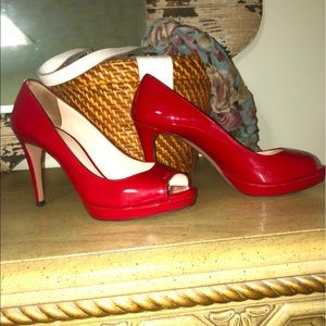Prada in red peep toe